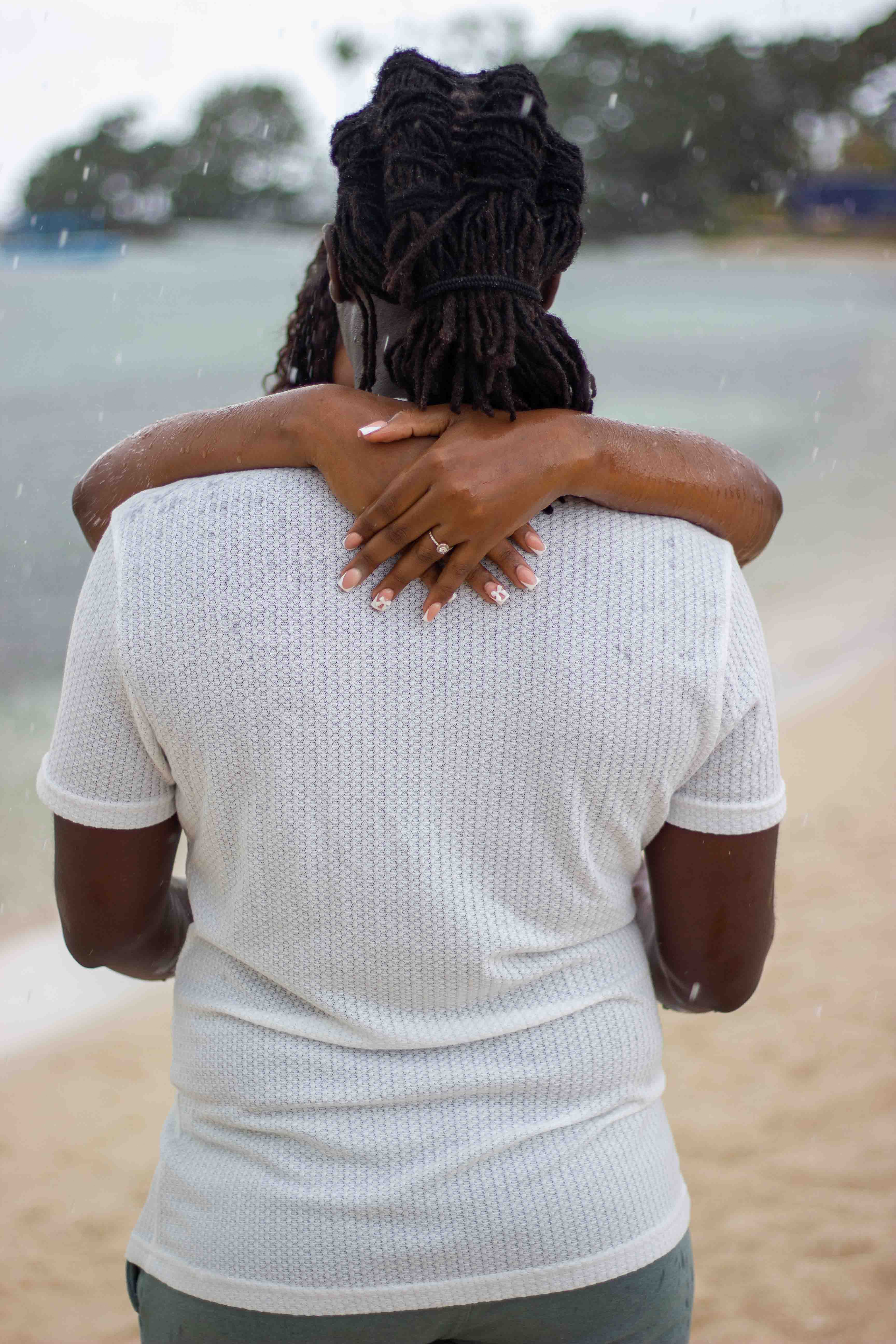 Couple out in the rain on the Island of Jamaica for an engament shoot